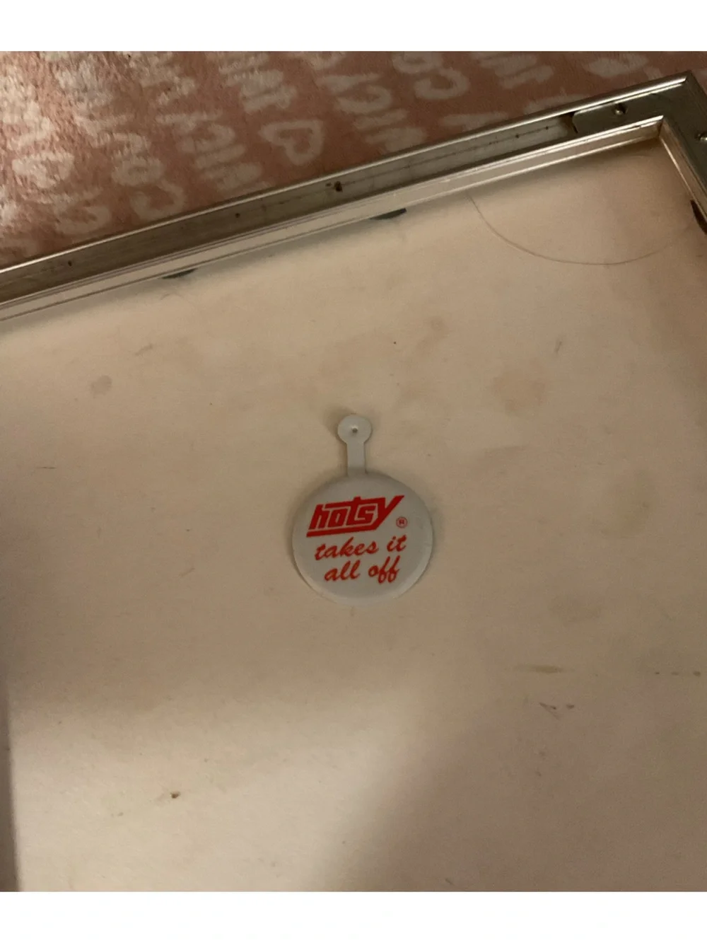 Vintage Hotsy Takes It All Off Folding Button